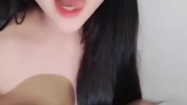 萌萌的骚妹子全程露脸大秀直播，童颜巨乳发育的真不错，风骚大屁股无毛白虎逼，穿上黑丝更诱惑抠到高潮不断